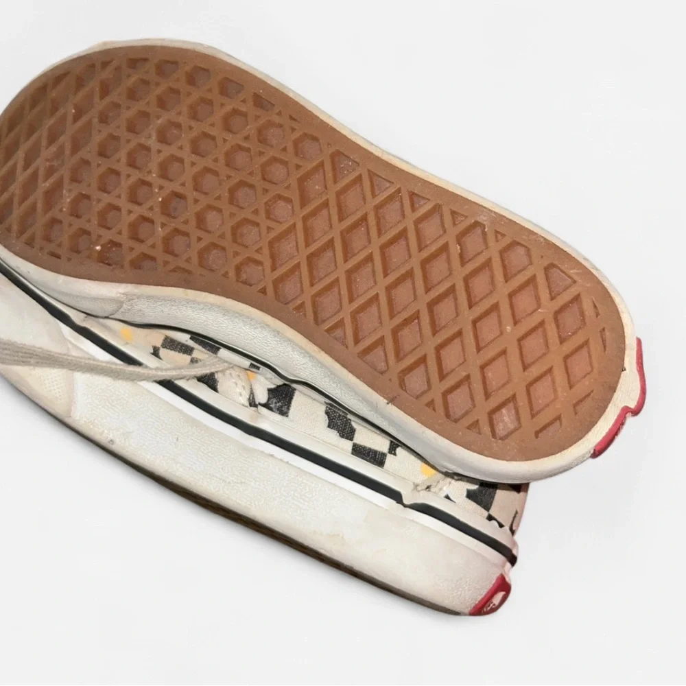 Vans Kids' Black and White Checkered Sneakers with Yellow Flowers